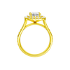 A profile view of the Emerald cut diamond engagement ring in 14k yellow gold with a channel band and double halo setting