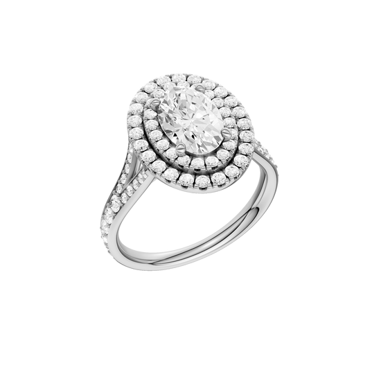 A three-quarter view of the Oval cut diamond engagement ring in platinum with a channel band and double halo setting