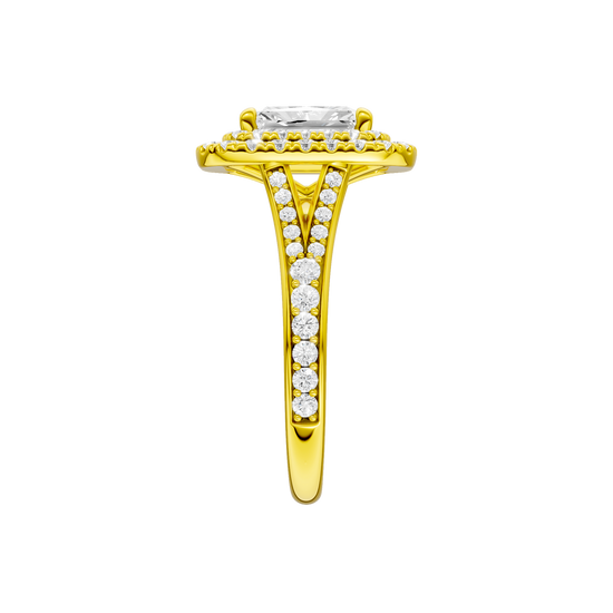 A side view of the Radiant cut diamond engagement ring in 14k yellow gold with a channel band and cathedral setting