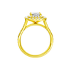 A profile view of the Radiant cut diamond engagement ring in 14k yellow gold with a channel band and cathedral setting