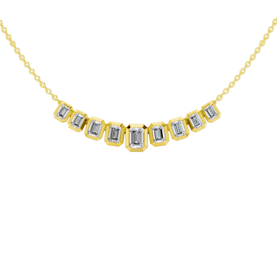Front view of a delicate graduated emerald-cut diamond necklace in yellow gold, featuring smaller step-cut diamonds arranged in a soft curved silhouette.
