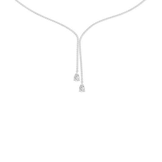 A close-up view of the 14K white gold Aurora Lariat necklace's drop, highlighting the two terminating brilliant diamonds.