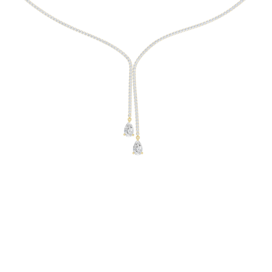 A close-up view of the 14K yellow gold Aurora Lariat necklace's drop, highlighting the two terminating brilliant diamonds.