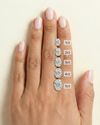 Diamond carat sizes on a hand