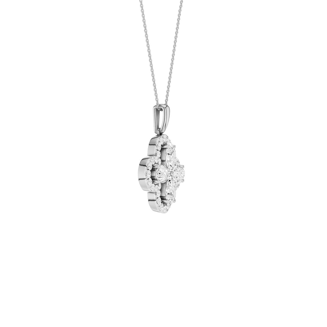 Angled view of a white gold pendant necklace featuring white diamonds and a warm polished gold finish.