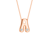 A high-polish 14k rose gold initial pendant by Amorati featuring star and geometric insets with shimmering round-cut lab-grown diamonds. Amorati’s signature F O U R T E E N T H Collection