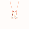 Amorati Diamond Bubble Pop Monogram A Initial Necklace in 14K rose gold. The pendant necklace featuring the letter 'A' with two small lab grown diamonds, suspended from a delicate rose gold chain against a solid white background.