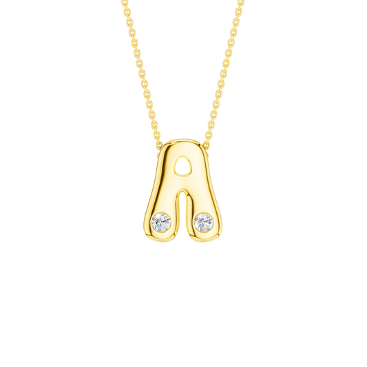 A high-polish 14k yellow gold initial pendant by Amorati featuring star and geometric insets with shimmering round-cut lab-grown diamonds. Amorati’s signature F O U R T E E N T H Collection