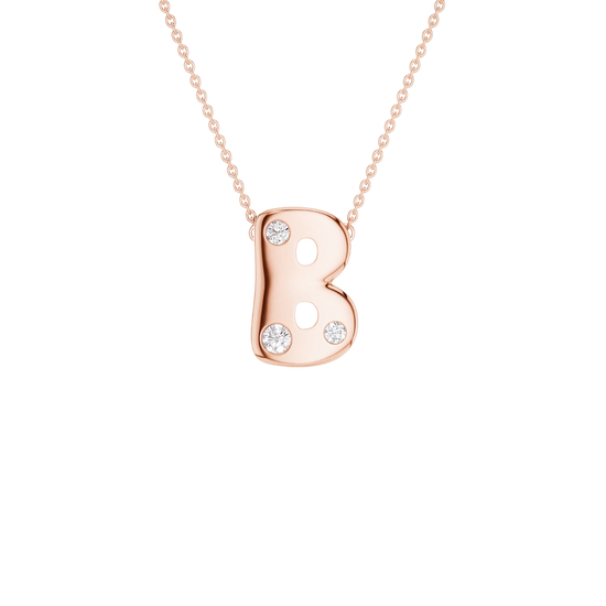 A rose gold letter 'B' pendant necklace with three small clear gemstones, suspended from a delicate rose gold chain against a solid white background.