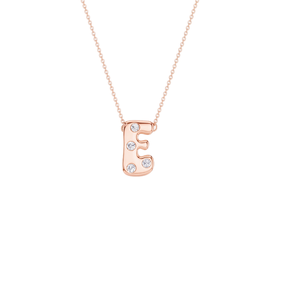 A rose gold initial necklace featuring the letter 'E' adorned with small clear gemstones, suspended from a delicate matching chain against a solid white background.