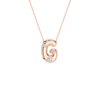 A rose gold initial necklace featuring the letter 'G' pendant adorned with three clear round-cut gemstones, suspended from a delicate matching chain against a solid white background.