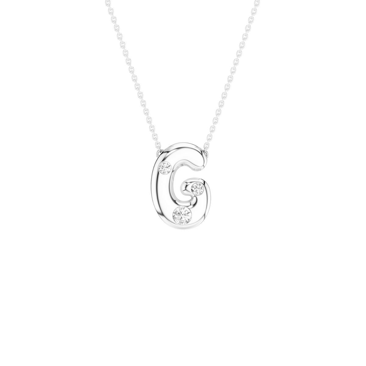 A silver initial necklace featuring the letter 'G' pendant adorned with small clear gemstones, suspended from a delicate silver ball chain against a solid white background.
