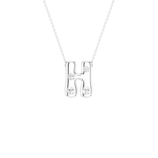 A silver initial pendant necklace featuring the letter 'H' adorned with small clear cubic zirconia stones, suspended from a delicate silver ball chain against a solid white background.