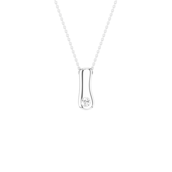 A silver pendant necklace featuring a polished, vertically oriented capsule-shaped pendant with a single round clear gemstone, suspended from a delicate silver chain against a solid white background.