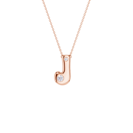 A rose gold initial pendant necklace featuring the letter 'J' adorned with two clear round-cut gemstones, suspended from a delicate matching chain against a solid white background.