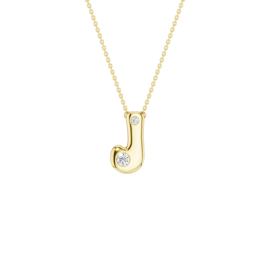 Modern 14k yellow gold bubble letter J initial necklace studded with two brilliant round-cut flush-set white diamonds on a delicate cable chain.