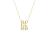 Modern 14k yellow gold bubble letter K initial necklace studded with three brilliant round-cut flush-set white diamonds on a delicate cable chain.