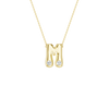 Modern 14k yellow gold bubble letter M initial necklace studded with two brilliant round-cut flush-set white diamonds on a delicate cable chain.