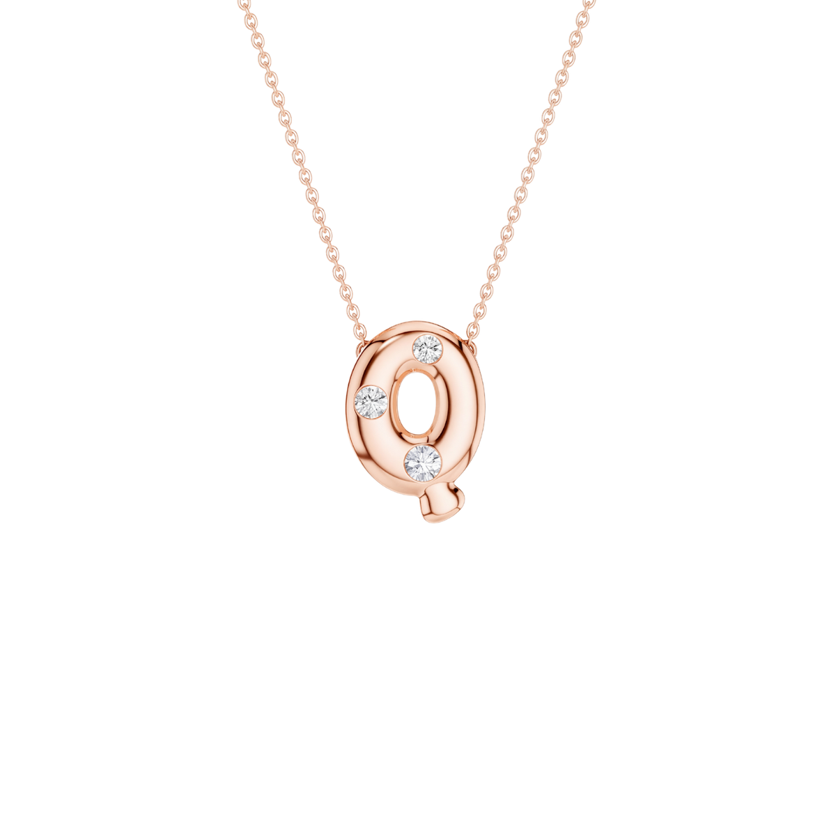A rose gold initial necklace featuring the letter 'Q' pendant adorned with four small clear gemstones, suspended from a delicate matching chain against a solid white background.