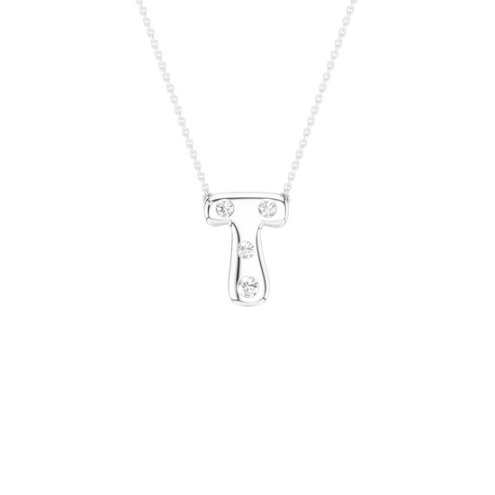 A silver initial pendant necklace featuring the letter 'T' adorned with three small clear gemstones, suspended from a delicate silver ball chain against a solid white background.
