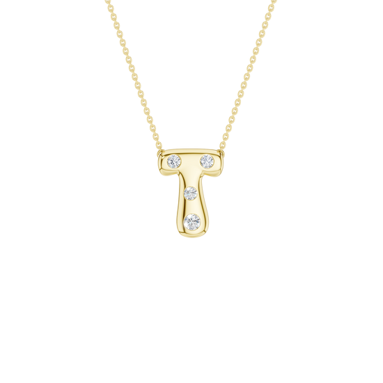 A product shot of a yellow gold necklace featuring a fine cable chain attached to the top edge of a smooth, bubble-font letter 'T' pendant. The polished gold 'T' is embellished with four sparkling, flush-set round diamonds: two placed along the top horizontal bar, and two spaced descending down the central vertical stem.