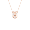 A rose gold U-shaped pendant necklace with three small clear gemstones, suspended from a delicate matching chain on a solid white background.