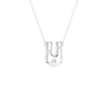 A silver U-shaped pendant necklace with three small clear gemstones, shown on a delicate silver chain against a solid white background.