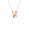 A rose gold initial necklace featuring the letter 'y' adorned with three small clear round-cut gemstones, suspended from a delicate matching chain against a solid white background.