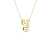 A product shot of a yellow gold necklace featuring a fine cable chain attached to a smooth, bubble-font lowercase letter 'Y' pendant. The polished gold 'Y' is embellished with three sparkling, flush-set round diamonds placed along its curves.