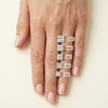 On-hand comparison of princess cut diamonds from 1 carat, 2 carat, 3 carat, 4 carat, 5 carat.