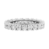 A brilliant 14k white gold eternity ring showcasing a continuous circle of premium round-cut diamonds in a modern twist-prong setting.