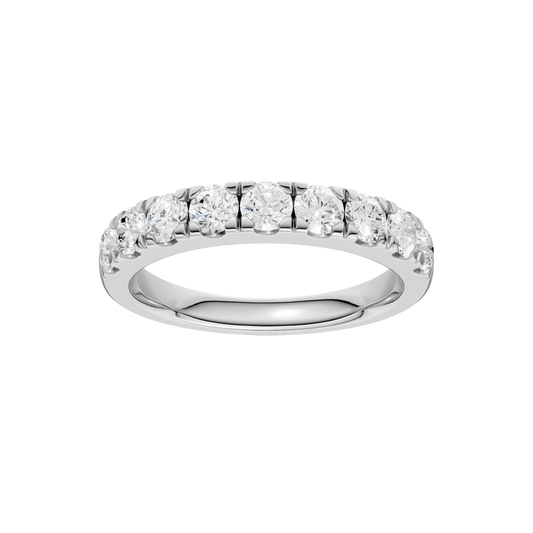 A top-down view of a 14K white gold band ring with a continuous line of brilliant rectangular diamonds.