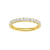 A dainty 14k yellow gold wedding band featuring 0.50 total carats of round-cut lab-grown diamonds in a classic half eternity setting.