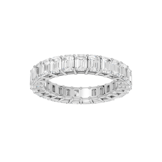 A top-down view of a 14K white gold eternity band with a continuous line of bold, horizontally-set rectangular jewels.