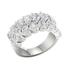 An angled view of a 14K white gold wide, domed ring, showcasing the magnificent, dense pavé.