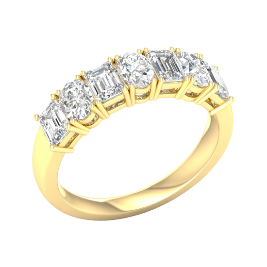 An angled view of a 14K yellow gold eternity ring, showcasing the magnificent line of diamonds.