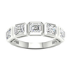 A top-down view of a 14K white gold ring with a continuous series of horizontal, square-cut diamonds.