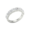 An angled view of a 14K white gold eternity ring, showcasing the brilliant line of princess-cut diamonds.