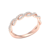 An angled view of a 14K rose gold braided ring, showcasing the intricate, brilliant pavé pattern.