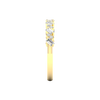 A side-profile view of a 14K yellow gold band ring, showing the height of the diamonds and the thin band.
