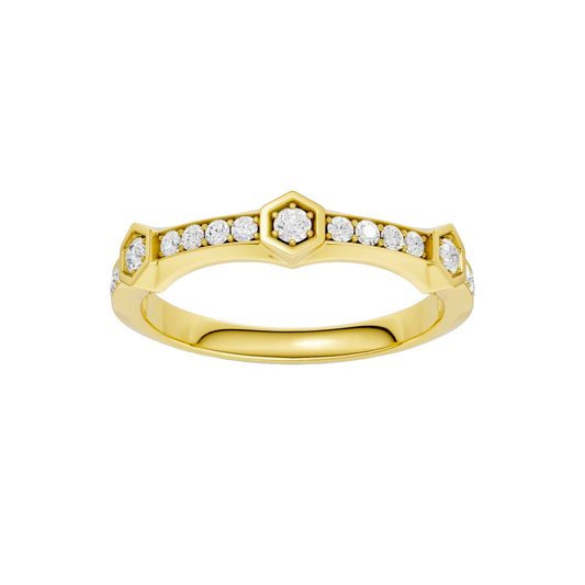 A top-down view of a 14K yellow gold ring with a series of geometric links and bezel-set diamonds.