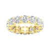 A top-down view of a 14K yellow gold wide band ring with a continuous row of large, bezel-set round jewels.