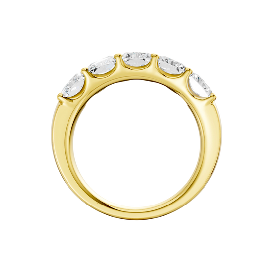 A side-profile view of a 14K yellow gold wide band ring, showing the tapered design and the five diamonds.