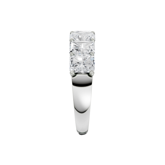 A side-profile view of a 14K white gold wide band ring, showing the secure setting and the five diamonds.