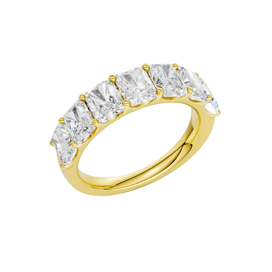 An angled view of a 14K yellow gold wide band ring, showcasing the clean, bold lines of the emerald-cut diamonds.