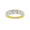 A top-down view of a 14K yellow gold wide band ring with five horizontally-set emerald-cut diamonds.