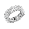 An angled view of a 14K white gold eternity band, highlighting the magnificent sparkle of the rectangular jewels.