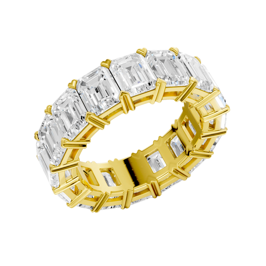 An angled view of a 14K yellow gold eternity band, highlighting the magnificent sparkle of the rectangular jewels.