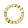 A front view of a 14K yellow gold eternity band, showcasing the brilliant sparkle of its rectangular jewels.