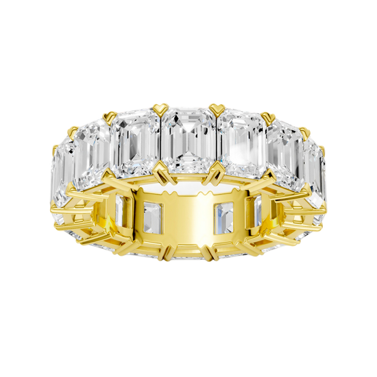 A top-down view of a 14K yellow gold eternity band with a continuous line of exceptionally bold, horizontally-set rectangular jewels.